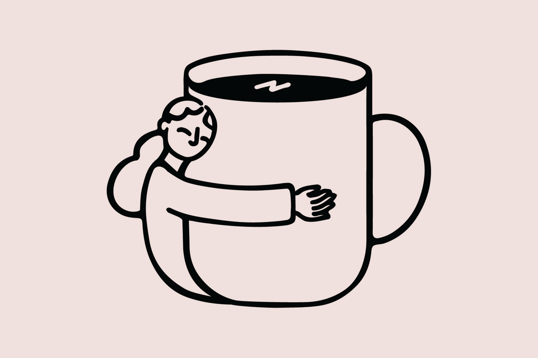 small lady hugging an oversized coffee mug