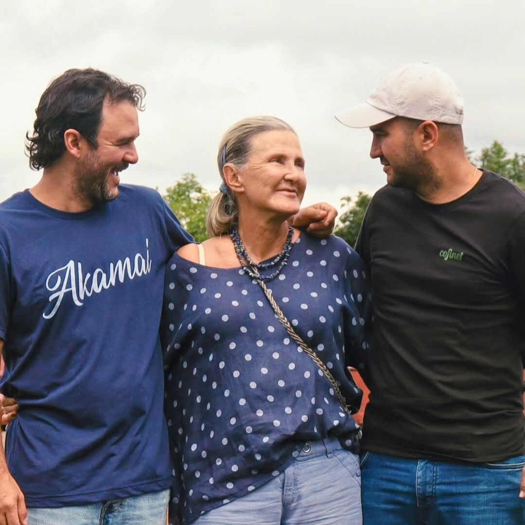 Luz Helena Salazar and her sons standing together outdoors