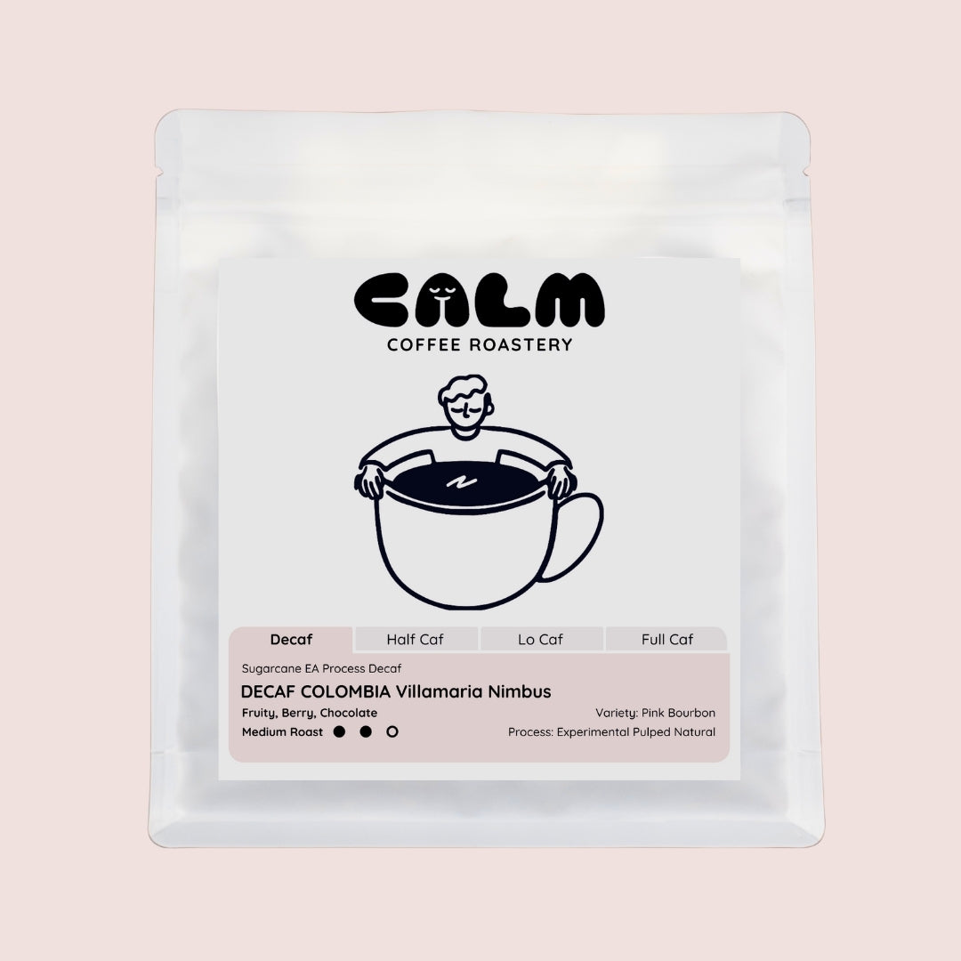 Calm Coffee Roastery decaf coffee bag on a light brown background