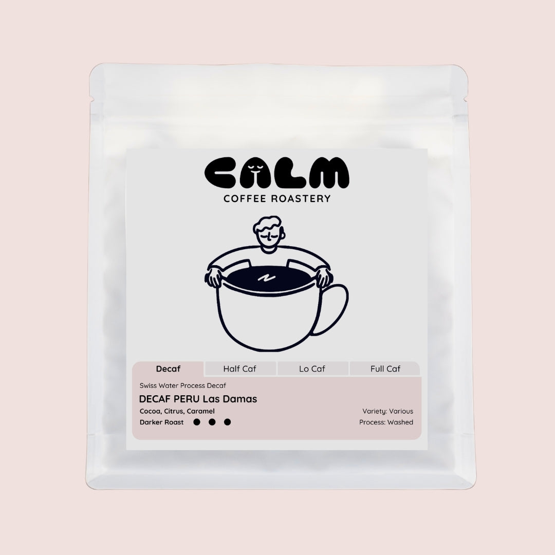 Calm Coffee Roastery coffee package on a light brown background
