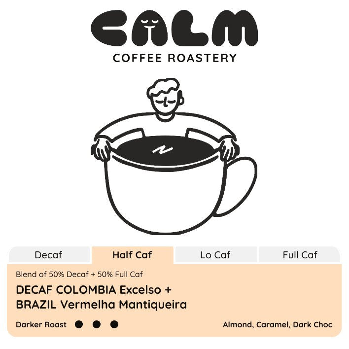 Calm Coffee Roastery logo with a Half Caf Decaf Colombia Excelso + Brazil Vermelha label displaying almond, caramel, and dark chocolate flavors