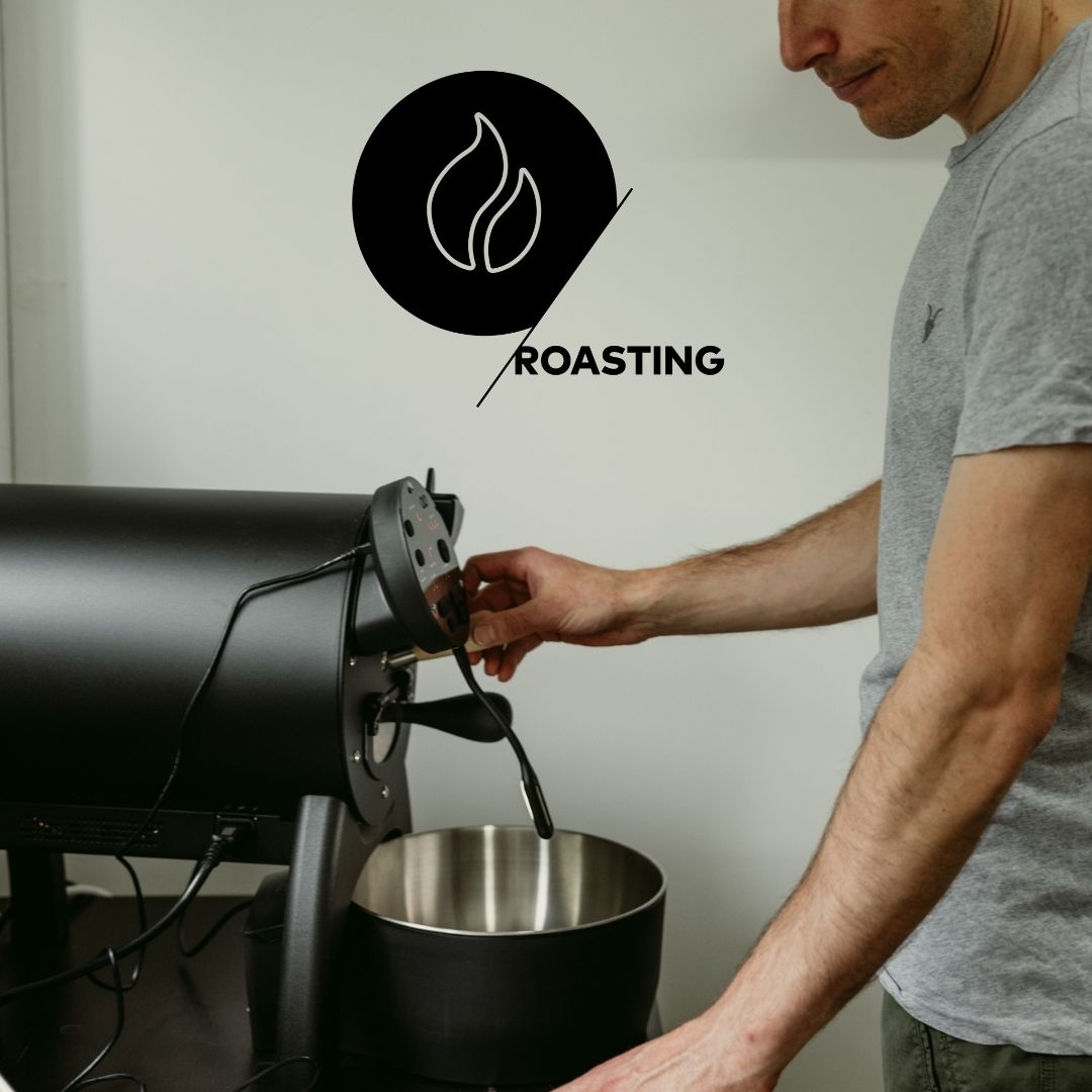Person using a coffee roasting machine with 'Roasting' logo above