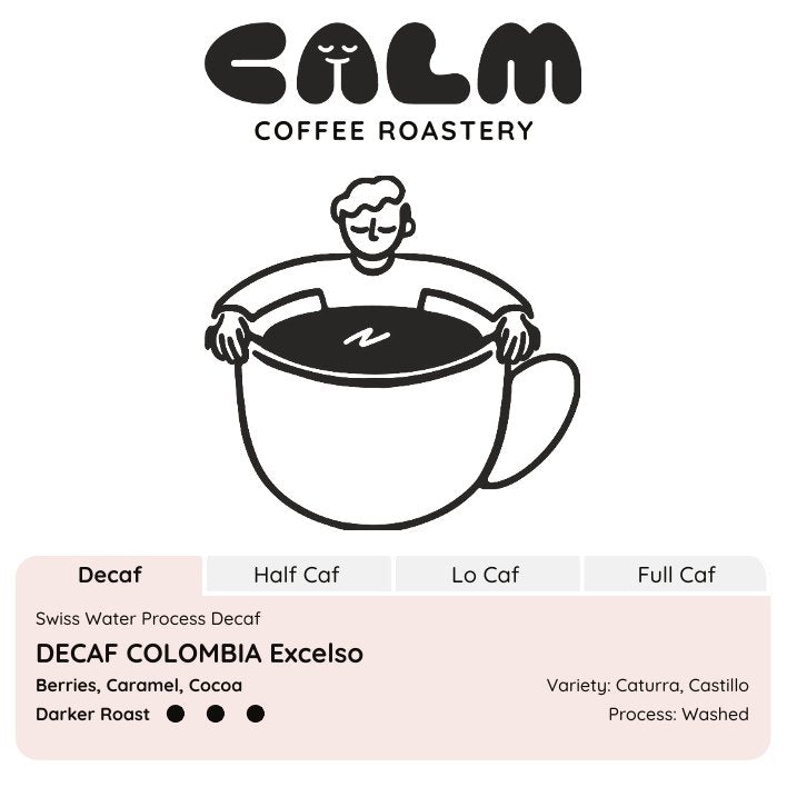 Decaf Colombia Excelso coffee label with Calm Coffee Roastery branding, showcasing darker roast and tasting notes of berries, caramel, and cocoa.