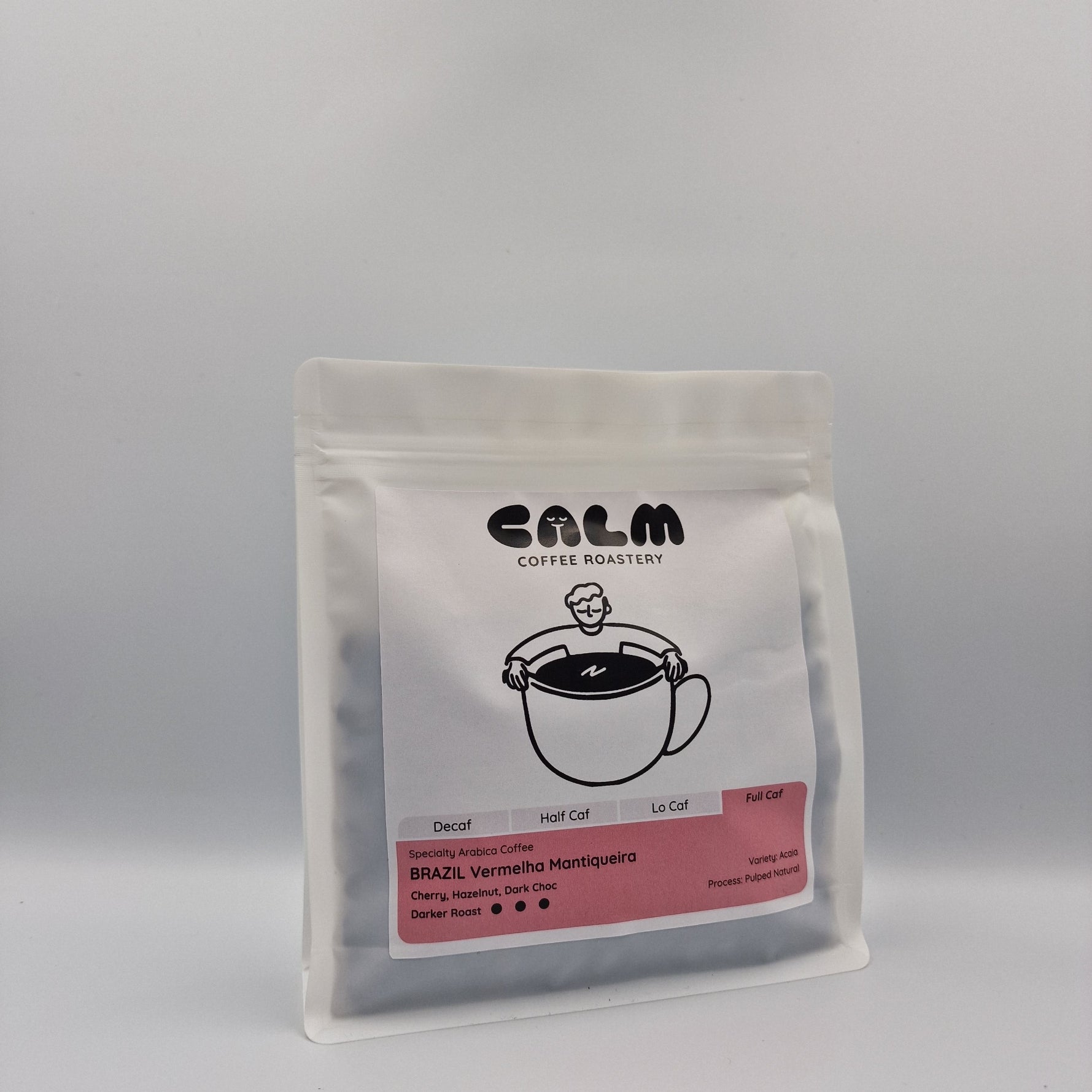 Calm Coffee Roastery Brazil Vermelha Mantiqueira coffee bag with tasting notes of cherry, hazelnut, and dark chocolate